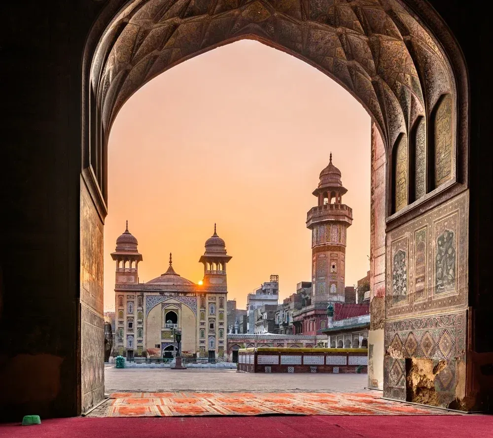 Wazir Khan Mosque seen through its gateway at sunset